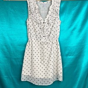 H & M, off-white, ruffled, sleeveless, mid-thigh dress.